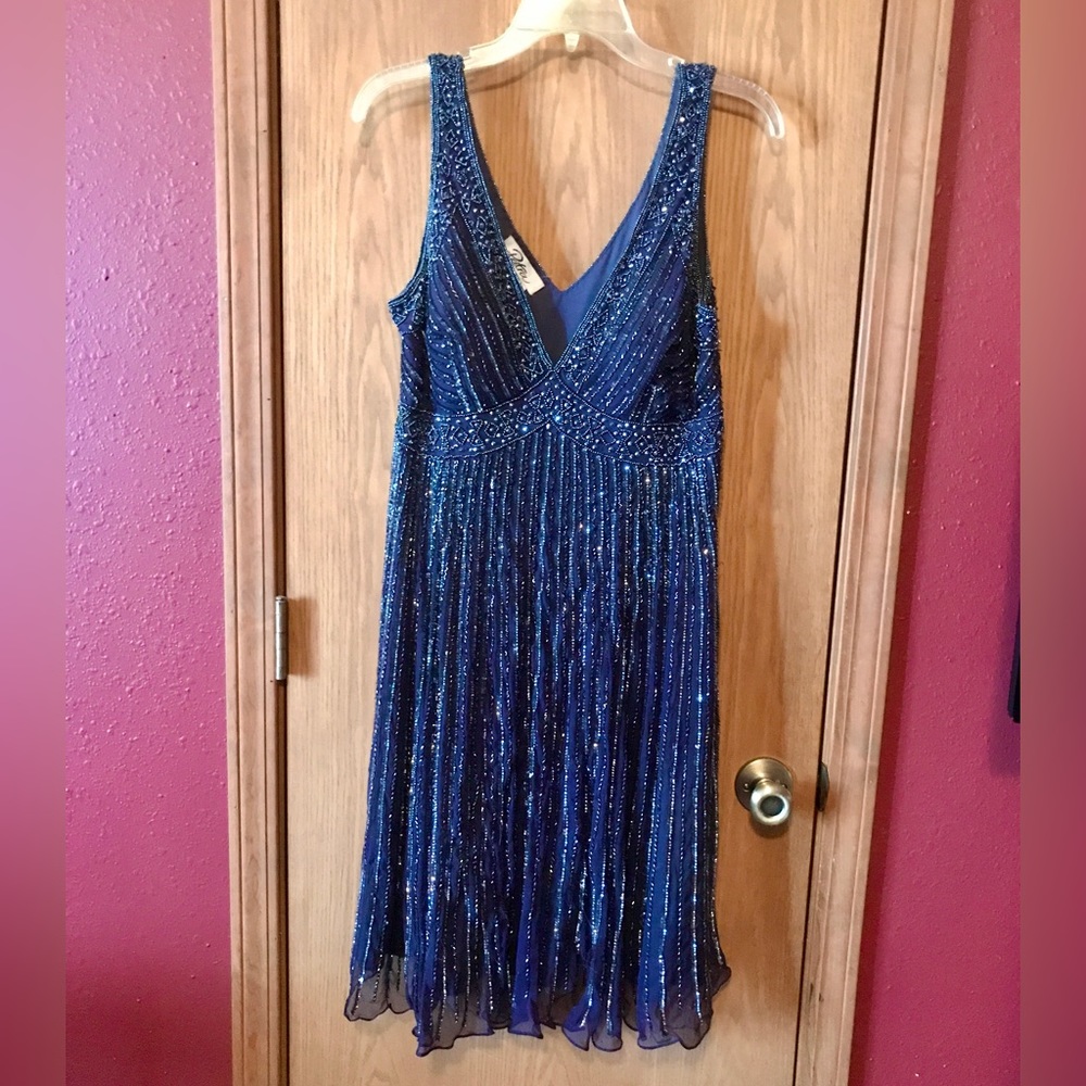 Women’s beaded special occasion dress.